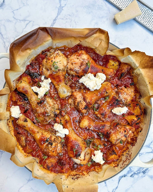 Tomato, chicken and potato tray bake