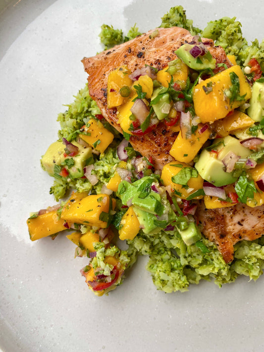 Wasabi broccoli mash with salmon and mango salsa