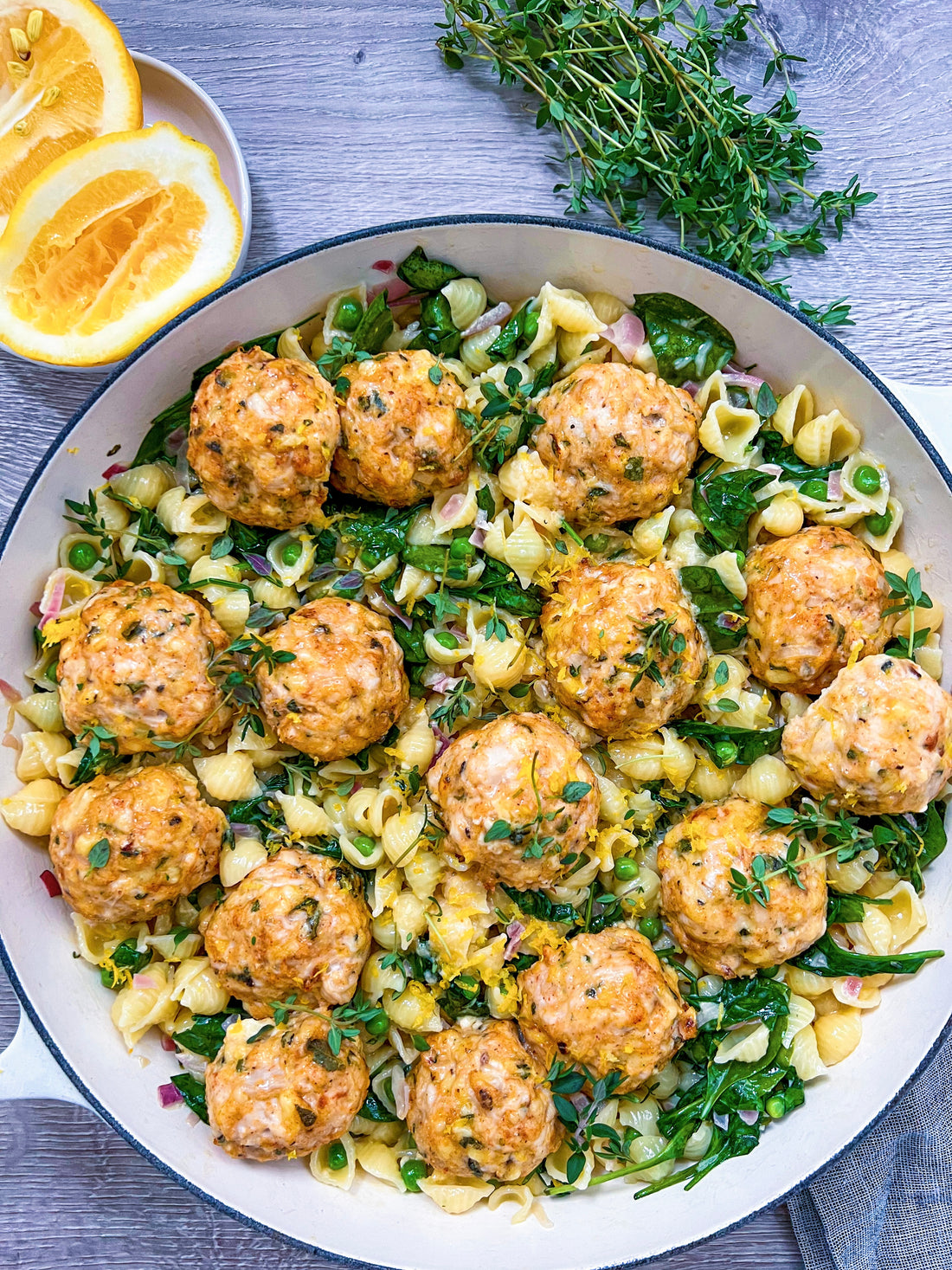 Cheesy sage and chicken meatballs with a creamy pea & spinach pasta