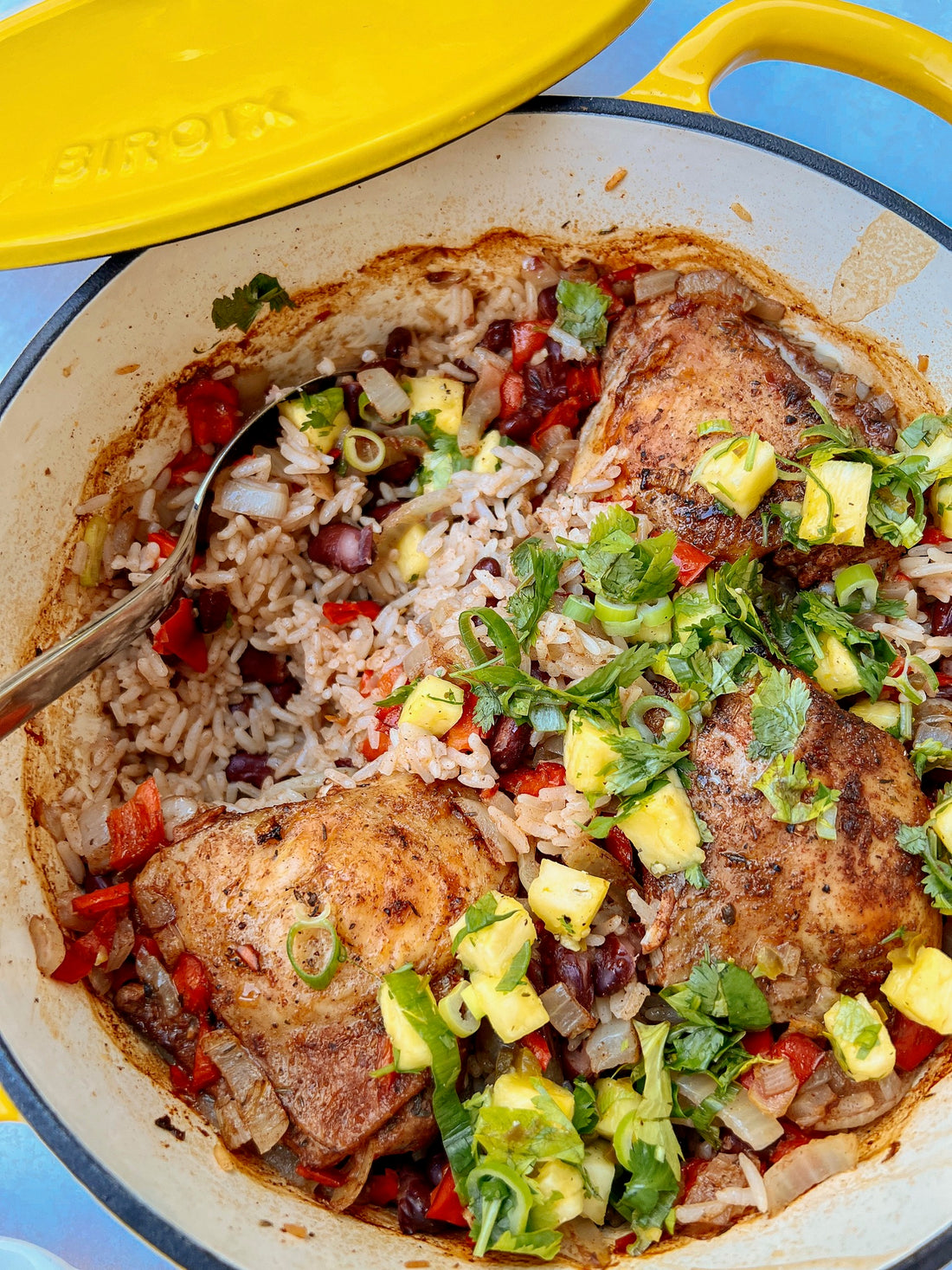 Jamaican inspired chicken & rice bake with a pineapple salsa.