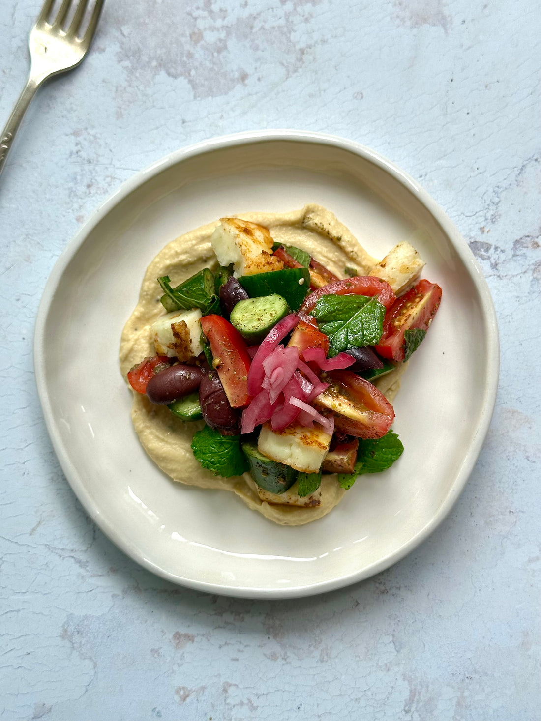 Za’atar tomato salad with grilled halloumi.