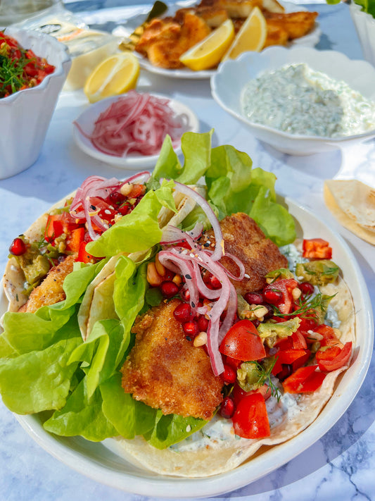 Crispy halloumi tacos with a quick olive salsa and herby mayo.