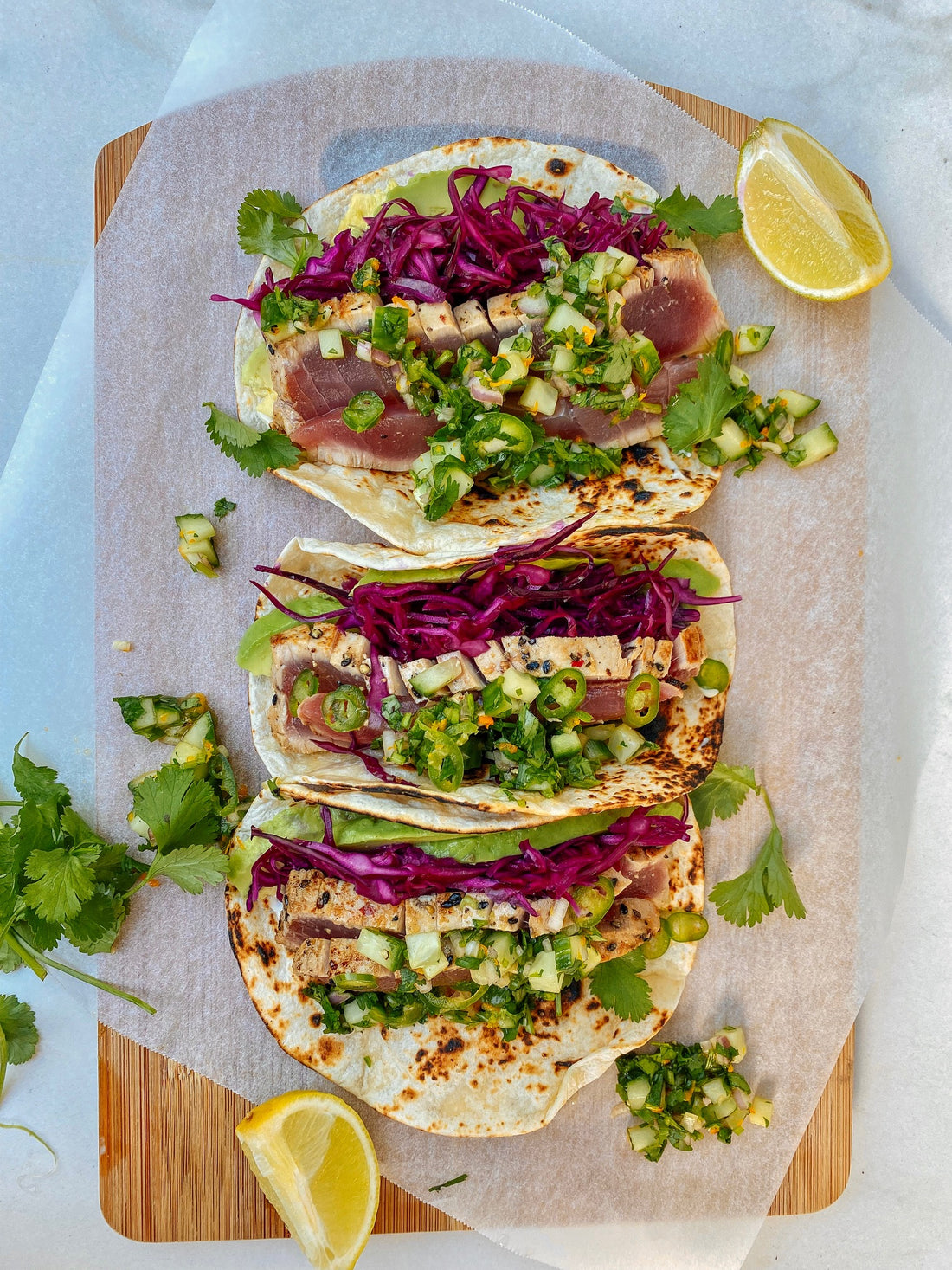 Asian style tuna tacos with a cucumber salsa