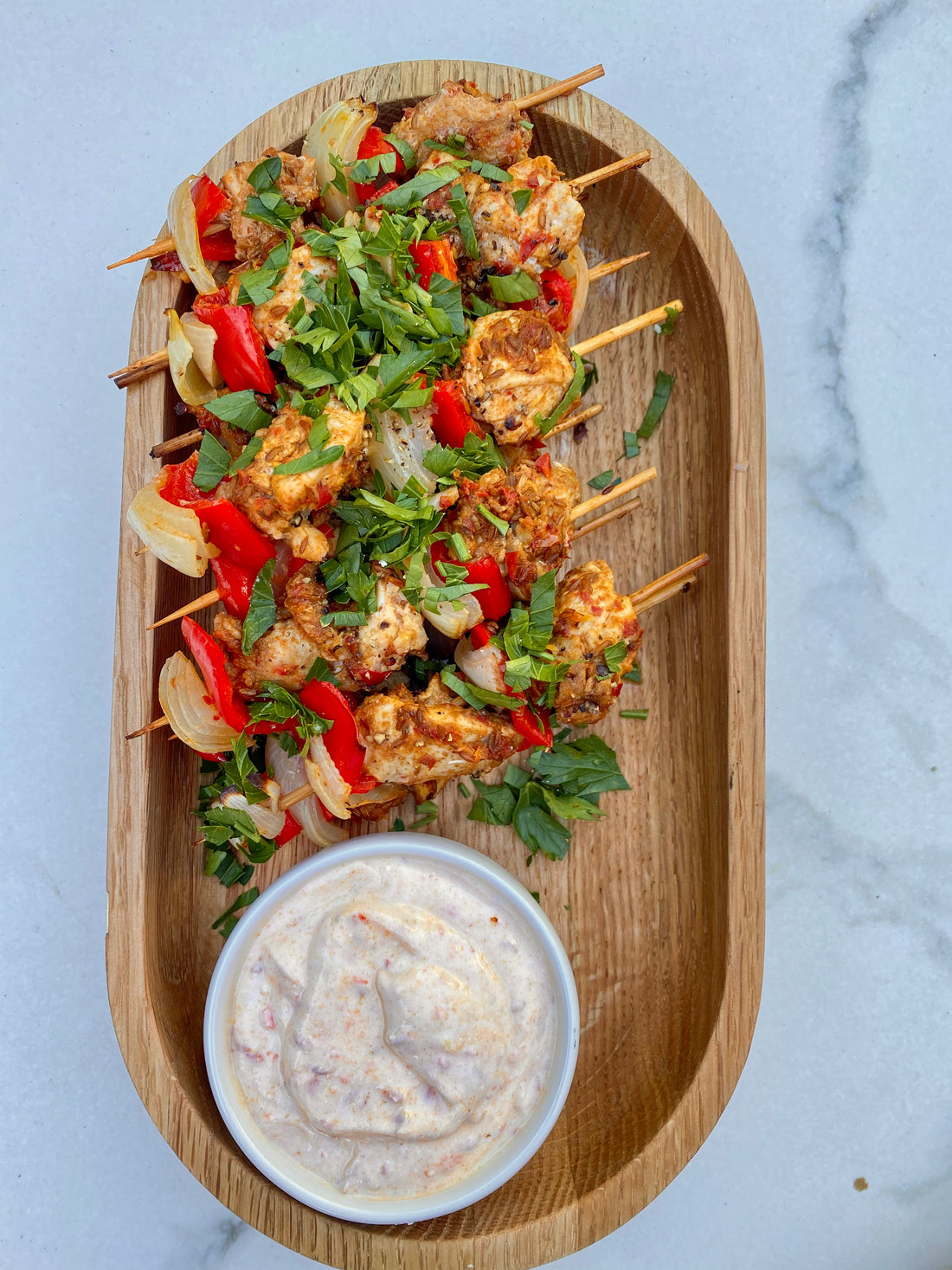 Harissa chicken skewers with a yoghurt sauce