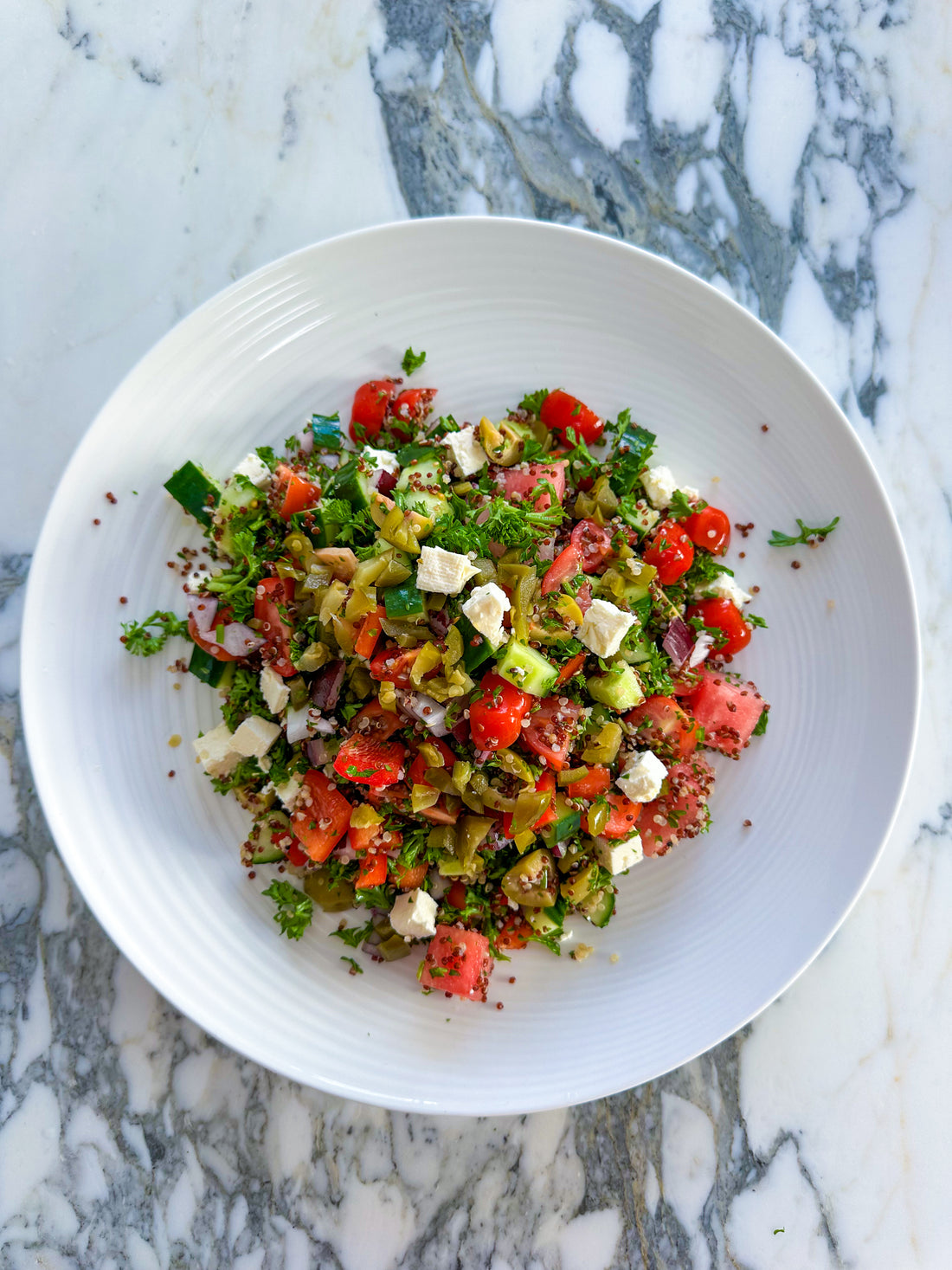 Greek inspired salad with quinoa and watermelon