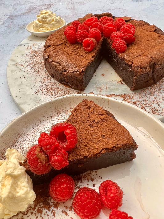 Chocolate torte topped with a sweet peanut butter drizzle