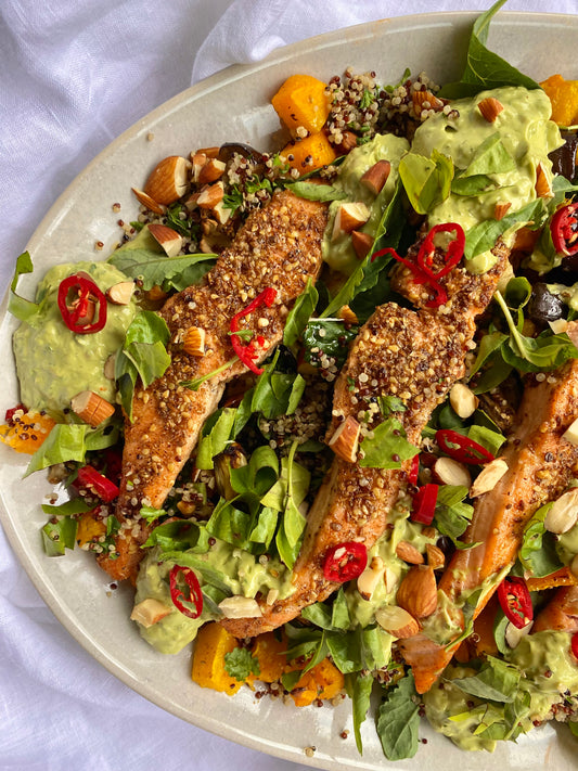 Crispy dukkah salmon with a roast veggie quinoa salad & avocado dressing